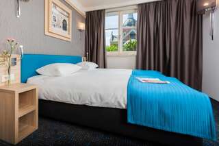Отель Hotel Legend Краков Улучшенный двухместный номер с 2 отдельными кроватями-2